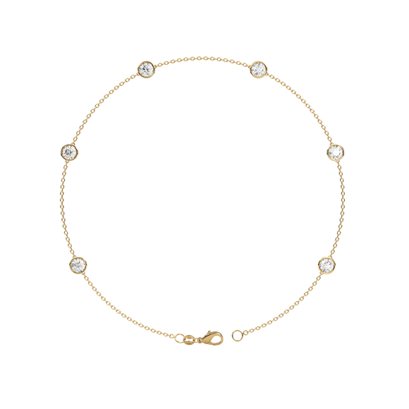 Bezel Station Anklet 14K Gold Round Cubic Zirconia A beautiful anklet that will never go out of style Perfect for any occasion!  You wont want to take this delicate piece off day or night. With a sleek and elegant design is sure to impress. Fashioned in solid 14K Gold with a flawless, brilliant-cut cubic zirconia. Finish your outfit with a simple elegant finishing touch.