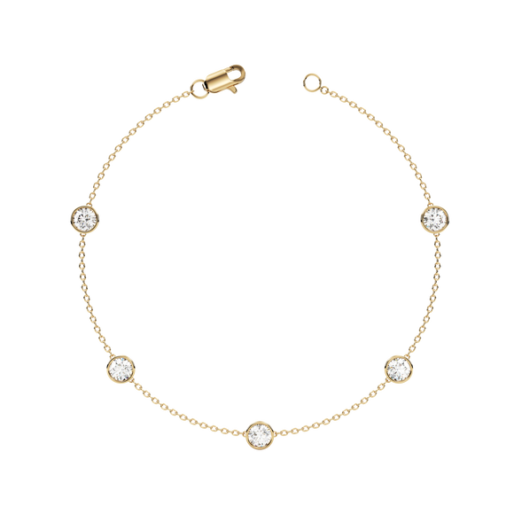 Bezel Station Bracelet 14K Gold Round Cubic Zirconia A beautiful bracelet that will never go out of style Perfect for any occasion!  You wont want to take this delicate piece off day or night. With a sleek and elegant design is sure to impress. Fashioned in solid 14K Gold with a flawless, brilliant-cut cubic zirconia. Finish your outfit with a simple elegant finishing touch.