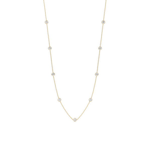 Bezel Station Necklace 14K Gold Round Cubic Zirconia A beautiful necklace that will never go out of style Perfect for any occasion! You wont want to take this delicate piece off day or night. With a sleek and elegant design is sure to impress. Fashioned in solid 14K Gold with a flawless, brilliant-cut cubic zirconia. Finish your outfit with a simple elegant finishing touch.