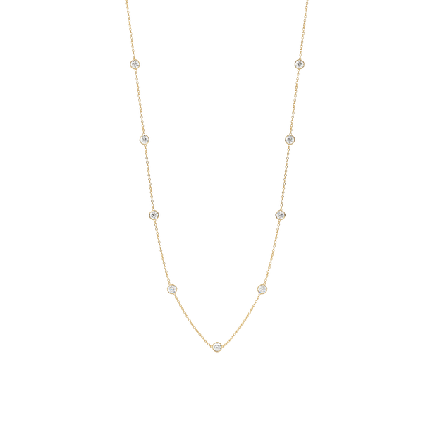 Bezel Station Necklace 14K Gold Round Cubic Zirconia A beautiful necklace that will never go out of style Perfect for any occasion!  You wont want to take this delicate piece off day or night. With a sleek and elegant design is sure to impress. Fashioned in solid 14K Gold with a flawless, brilliant-cut cubic zirconia. Finish your outfit with a simple elegant finishing touch.