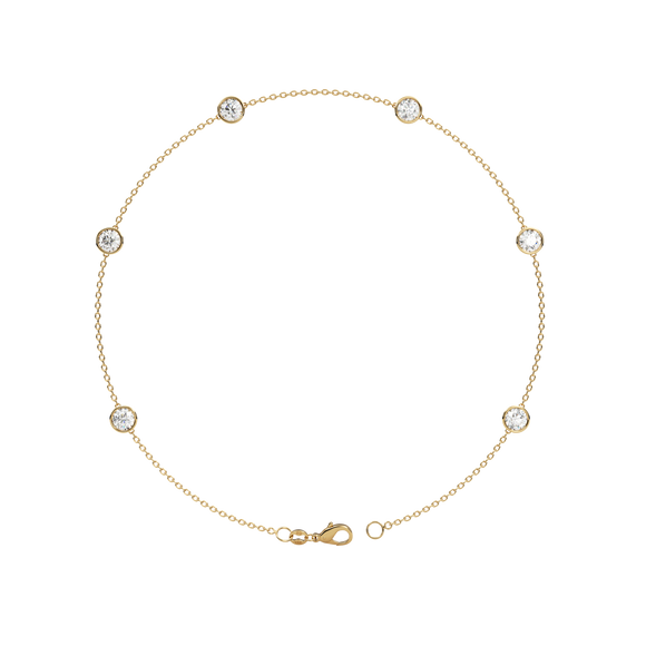 Bezel Station Anklet 14K Gold Round Cubic Zirconia A beautiful anklet that will never go out of style Perfect for any occasion!  You wont want to take this delicate piece off day or night. With a sleek and elegant design is sure to impress. Fashioned in solid 14K Gold with a flawless, brilliant-cut cubic zirconia. Finish your outfit with a simple elegant finishing touch. 