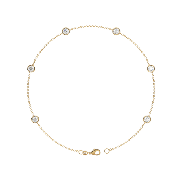 Bezel Station Anklet 14K Gold Round Cubic Zirconia A beautiful anklet that will never go out of style Perfect for any occasion!  You wont want to take this delicate piece off day or night. With a sleek and elegant design is sure to impress. Fashioned in solid 14K Gold with a flawless, brilliant-cut cubic zirconia. Finish your outfit with a simple elegant finishing touch. 