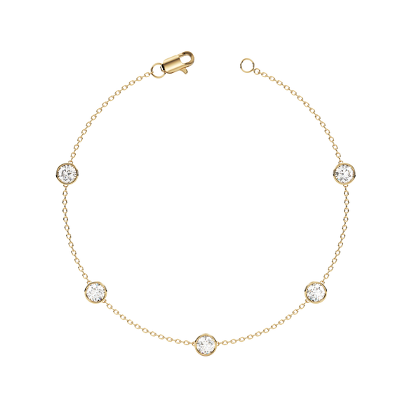 Bezel Station Bracelet 14K Gold Round Cubic Zirconia A beautiful bracelet that will never go out of style Perfect for any occasion!  You wont want to take this delicate piece off day or night. With a sleek and elegant design is sure to impress. Fashioned in solid 14K Gold with a flawless, brilliant-cut cubic zirconia. Finish your outfit with a simple elegant finishing touch. 