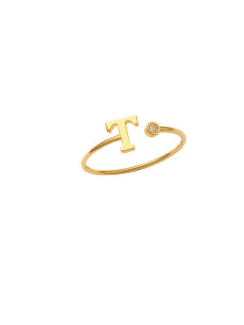 14K Gold Letter T Ring This trendy ring is an amazing statement. Lightweight durable and a sparkle to catch anyones eyes.   Each detail of the letter is carefully perfected and formed for easy reading. Simple and charming they can dress up every outfit with personalized style. Your everyday ring choose just got a whole lot easier. 