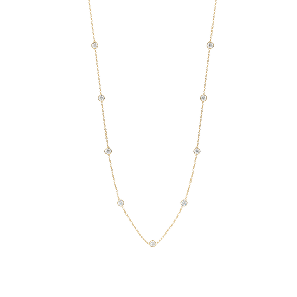 Bezel Station Necklace 14K Gold Round Cubic Zirconia A beautiful necklace that will never go out of style Perfect for any occasion!  You wont want to take this delicate piece off day or night. With a sleek and elegant design is sure to impress. Fashioned in solid 14K Gold with a flawless, brilliant-cut cubic zirconia. Finish your outfit with a simple elegant finishing touch. 